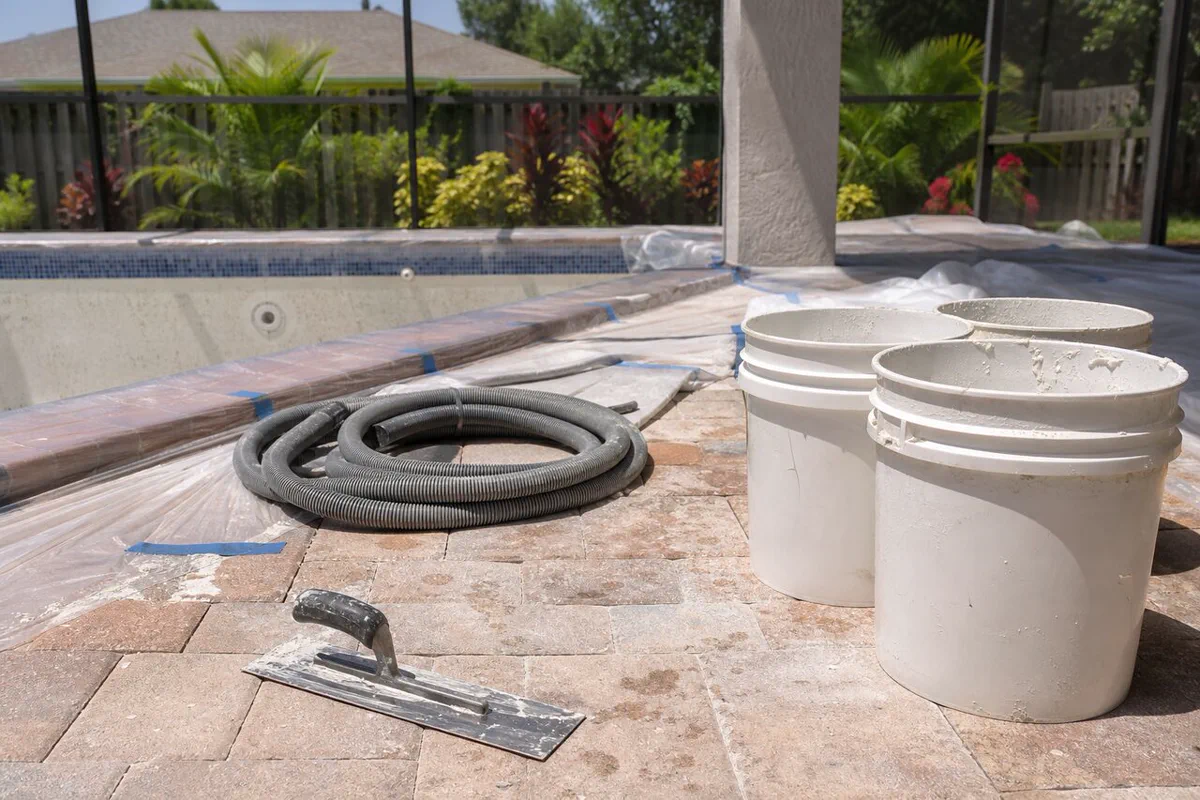 Illustrative pool finish material samples for a Palm Bay resurfacing conversation